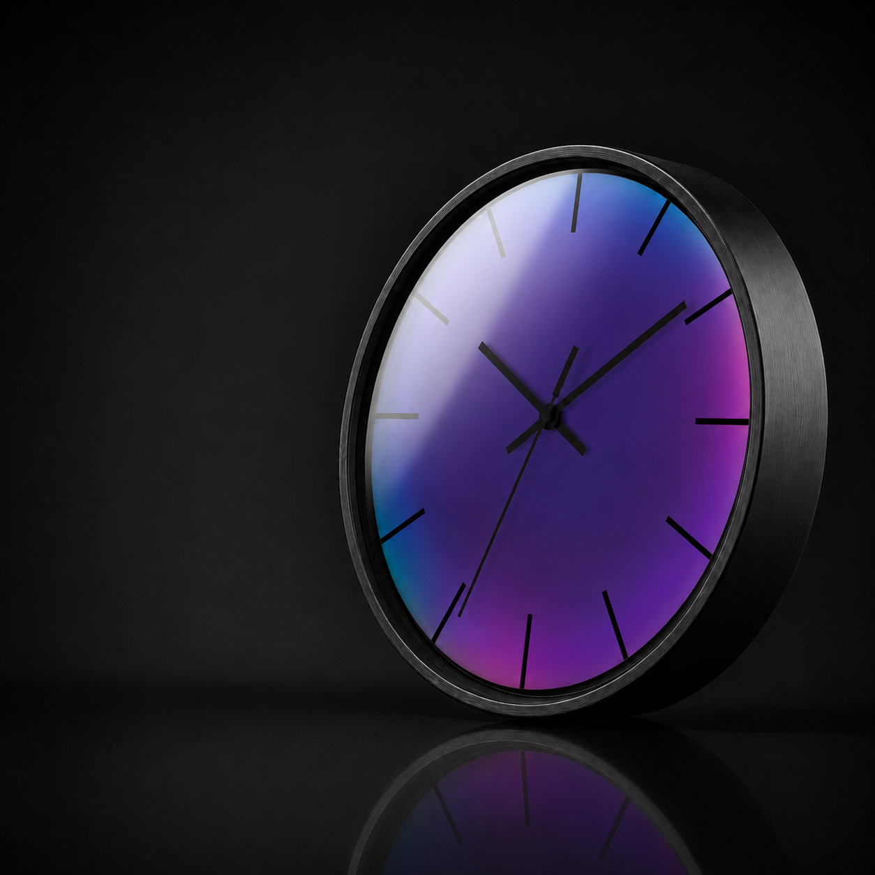 Las Vega Afterlight round wall clock with a black wooden frame and vibrant blue, violet and magenta gradient artwork, presented in a premium dark studio setting with a soft acrylic reflection and subtle mirrored surface.
