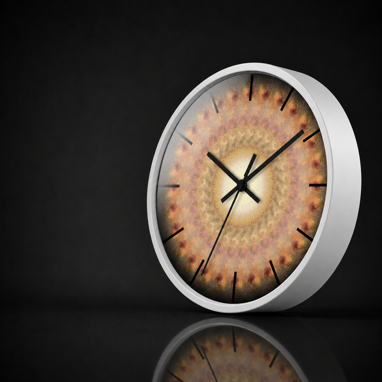Morpheus round wall clock with a white wooden frame and soft beige, blush and golden radial artwork, presented in a premium dark studio setting with a gentle acrylic reflection and subtle mirrored surface.