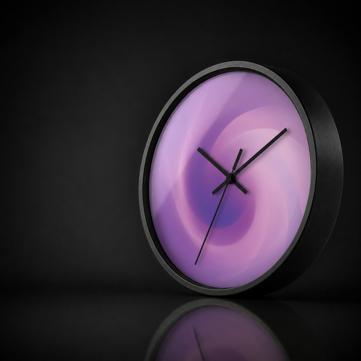 Purple May round wall clock with a black wooden frame and soft lavender and pink spiral artwork, presented in a premium dark studio setting with a gentle acrylic reflection and subtle mirrored surface.
