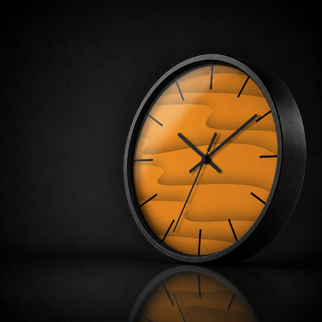 Sands of Time round wall clock with a black wooden frame and layered golden orange abstract landscape artwork, presented in a premium dark studio setting with a soft acrylic reflection and subtle mirrored surface.